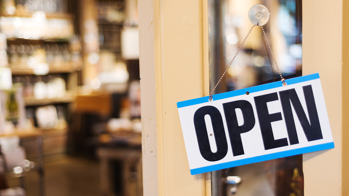 open sign on a business door